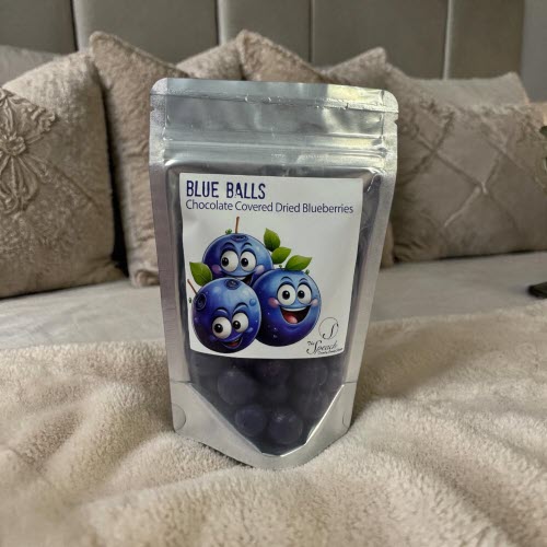 Blue Balls Package on Bed with Pilliows